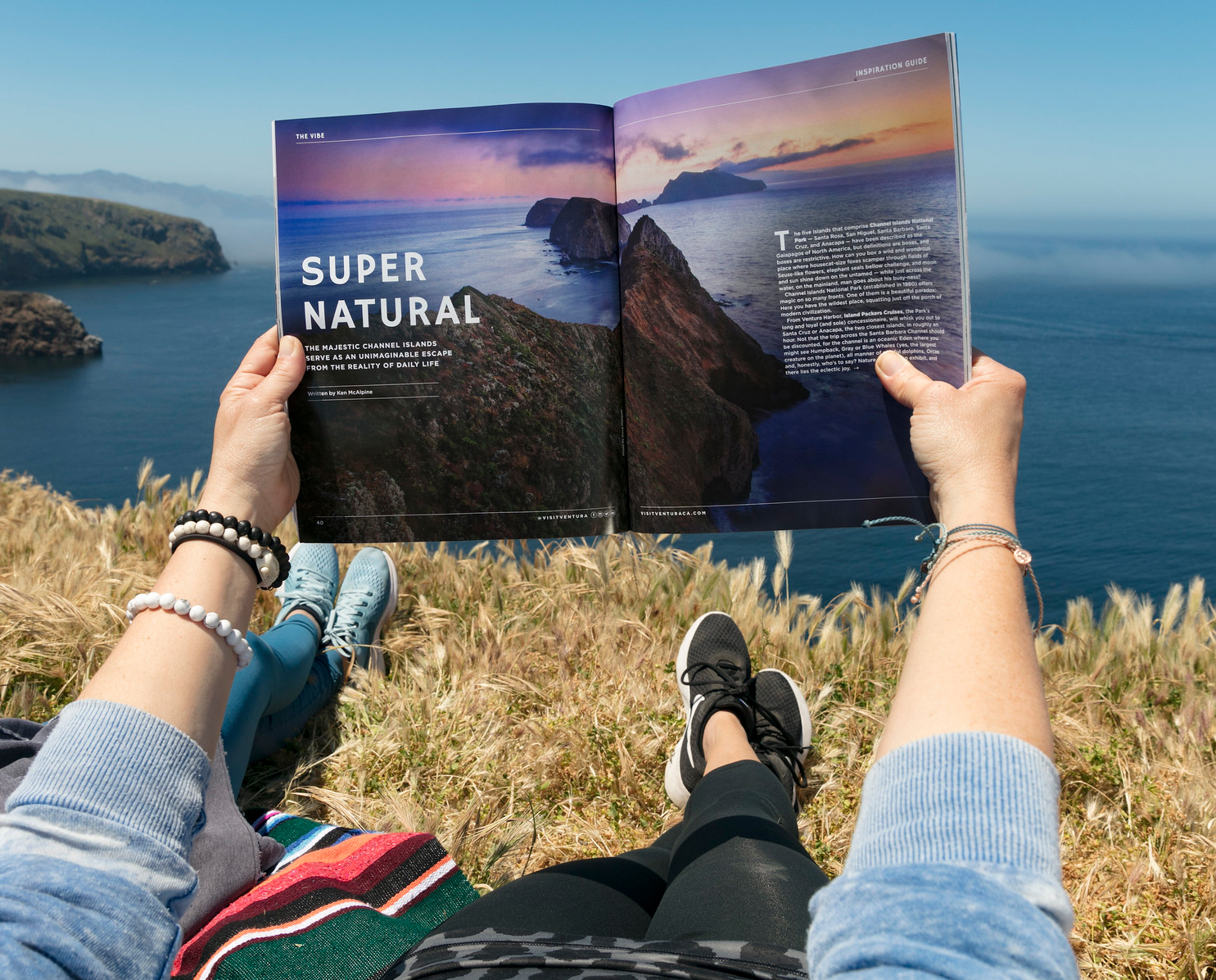 Hiker looking at a visitor guide