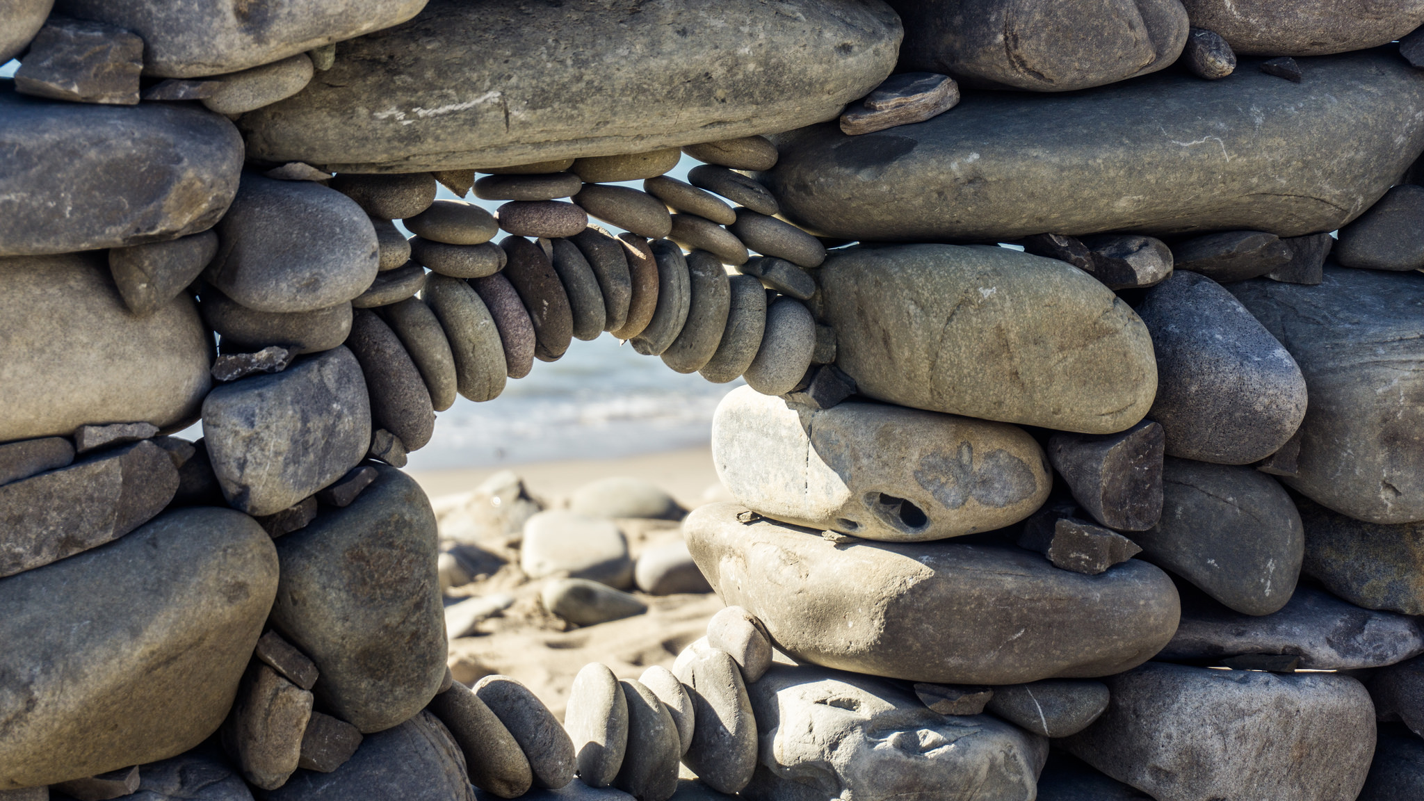 My name is Juan Manuel and I'm the man behind the stone art on Ventura beaches
