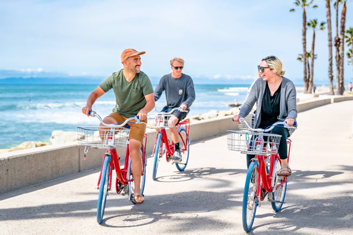 Friends riding bikes at surfers point ventura