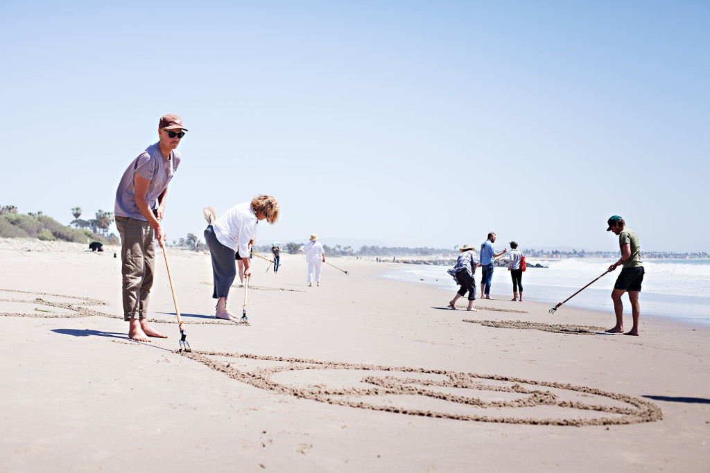 Andres Amador leads massive sand art project at Swami's Beach