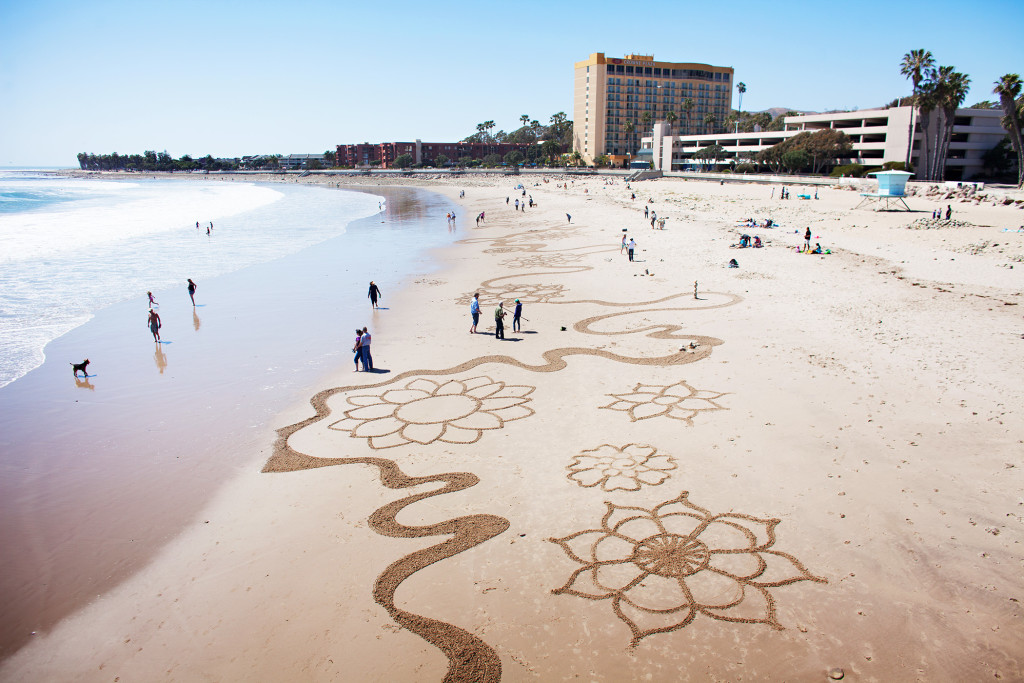 Andres Amador leads massive sand art project at Swami's Beach