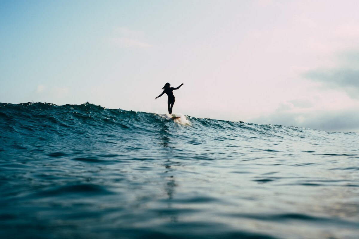 surfer hanging ten at surfers point