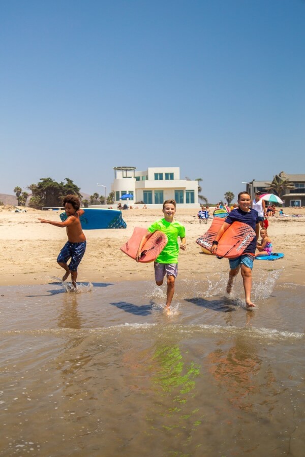 kids running at the beach