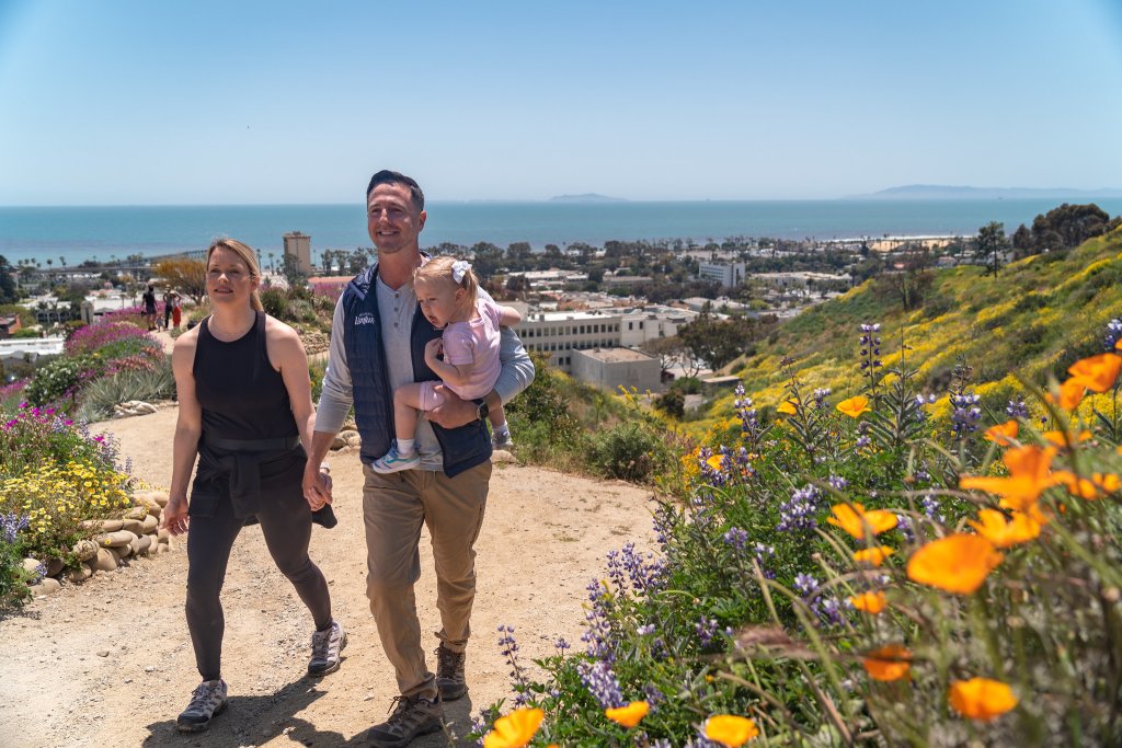 A family at Ventura Botanical Gardens during the spring, a great picturesque spot in Ventura