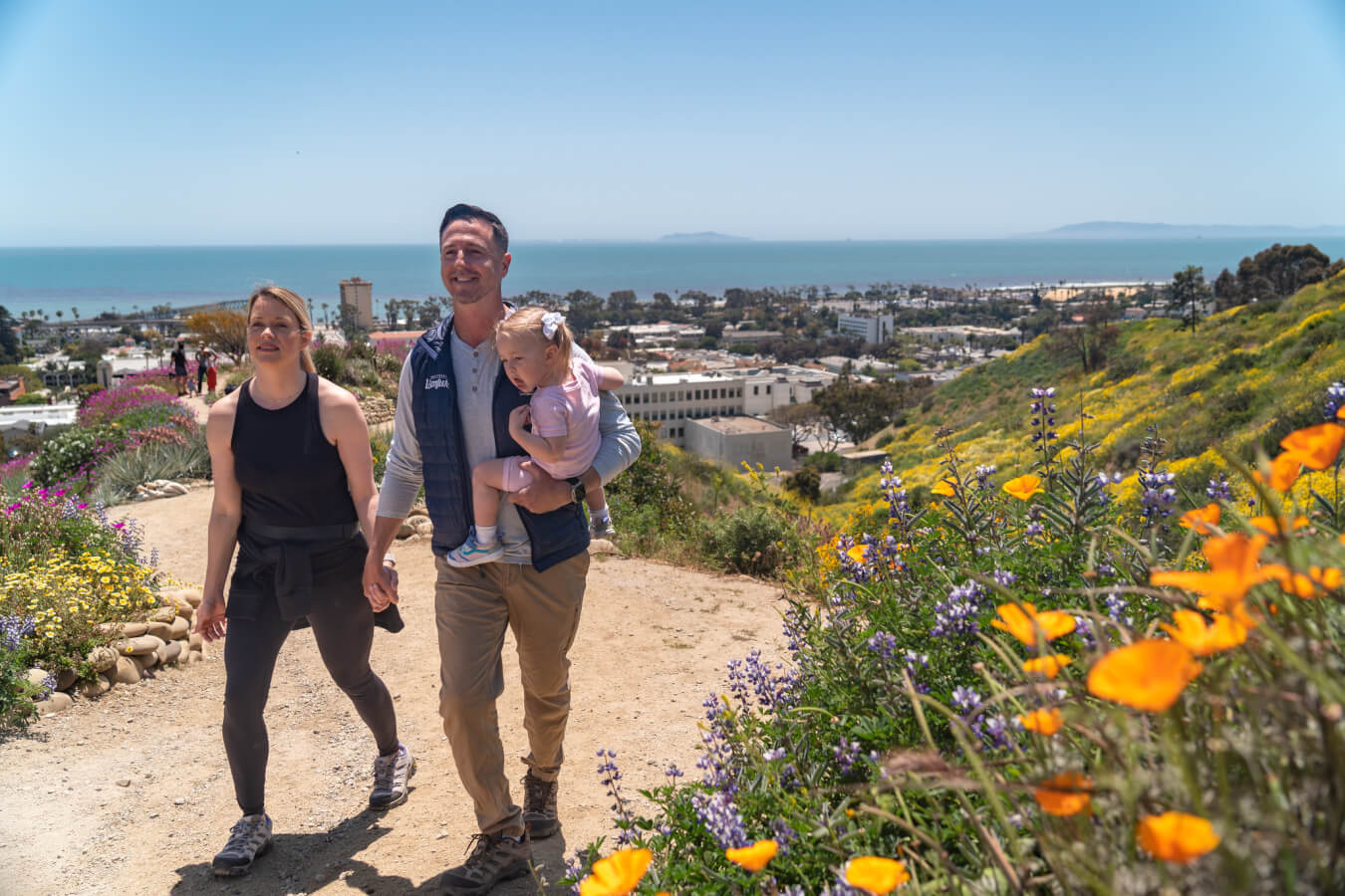 A family at Ventura Botanical Gardens during the spring, a great picturesque spot in Ventura