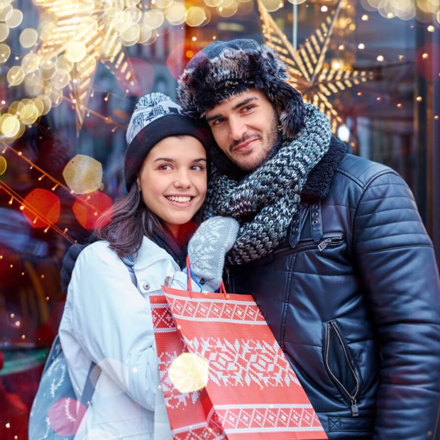 Woman and man Christmas shopping