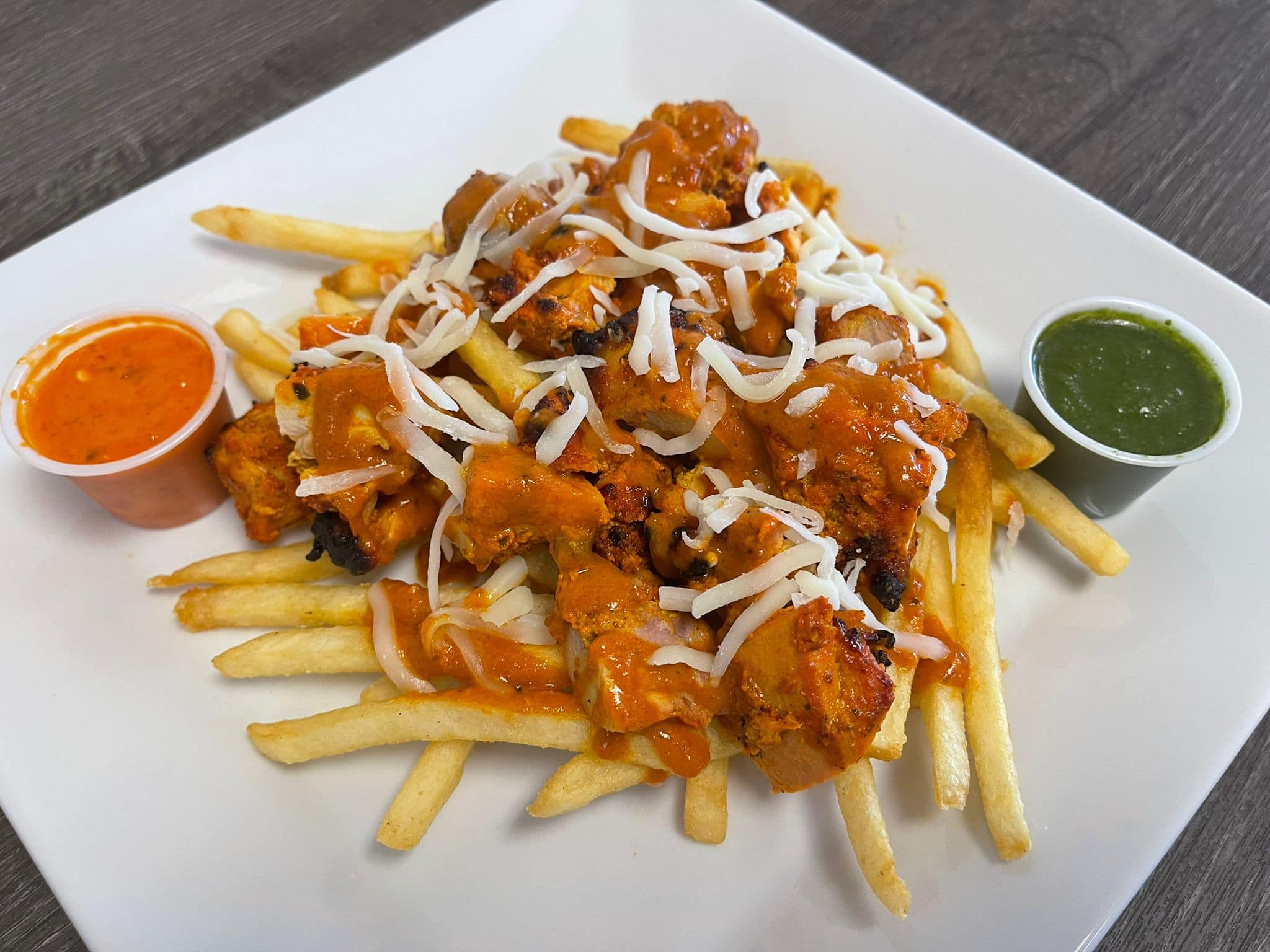 chicken poutine dish xgames himalaya cuisine