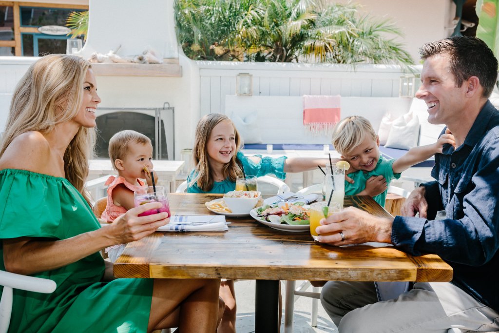 A family eating at a restaurant in Downtown Ventura