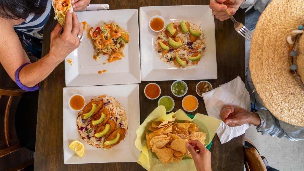 A group eating tacos in Downtown Ventura