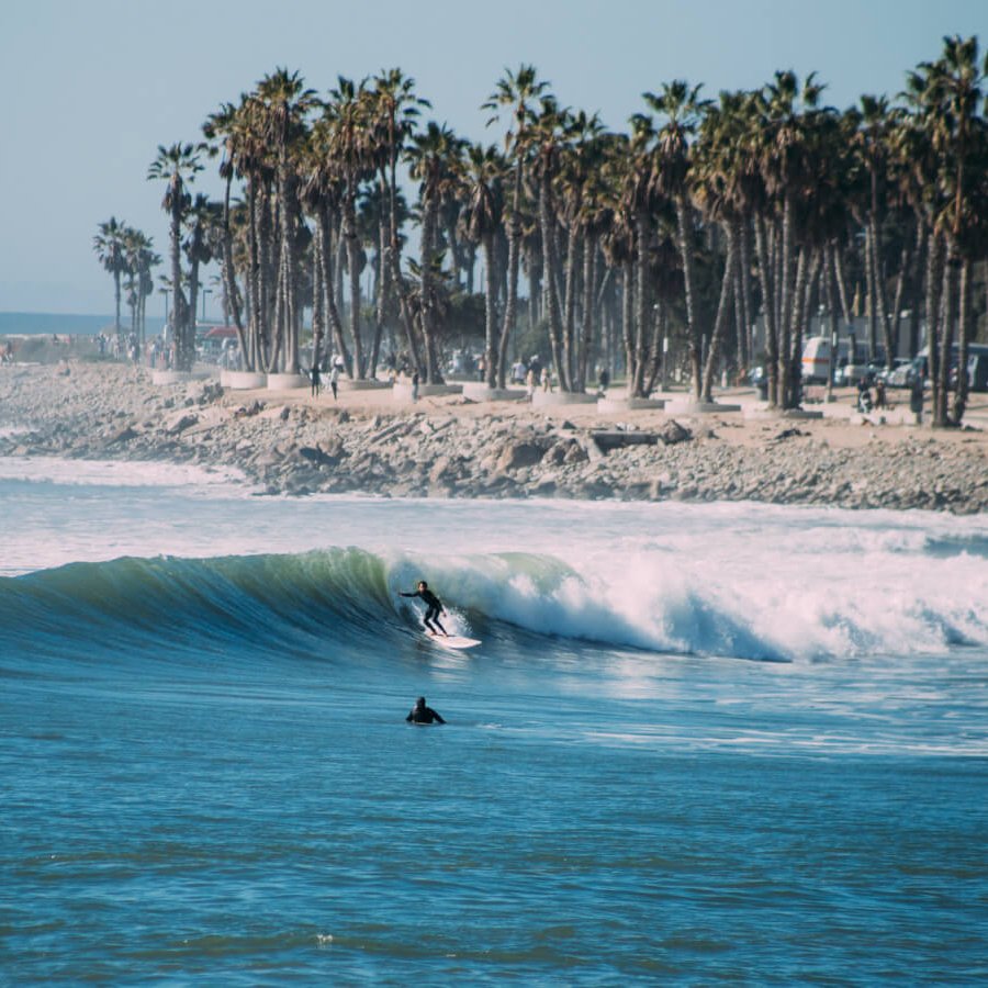 Watching surfers catch a wave is a fun activity in Ventura during the winter