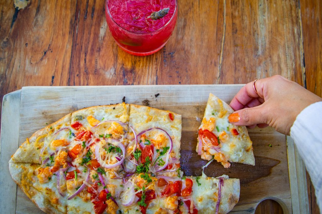 Get a vegetarian flatbread at Rumfish y Vino