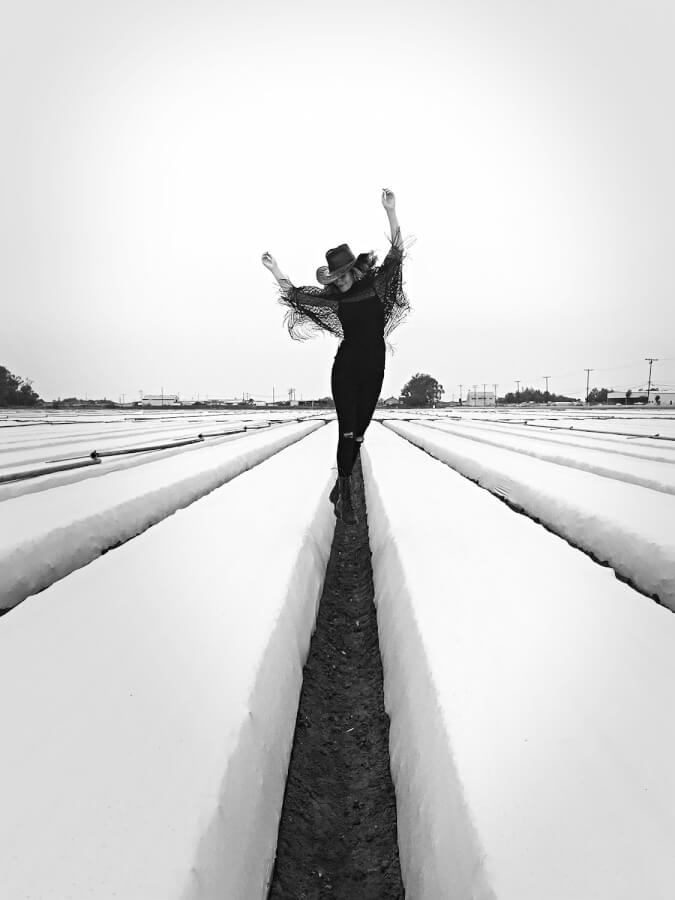 black and white photo of woman posing