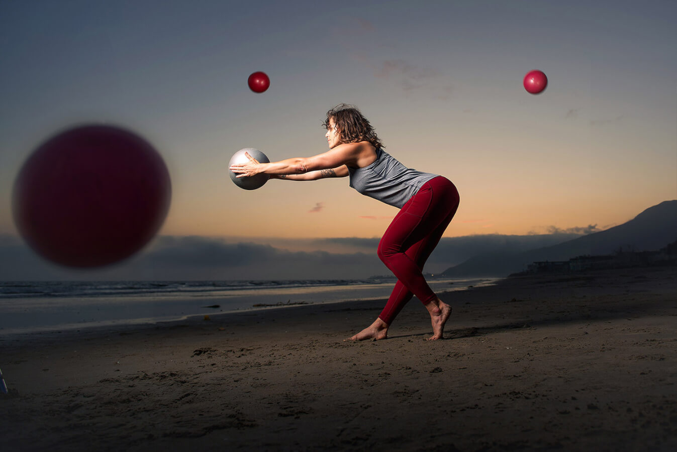 Woman doing yoga fitness on beach