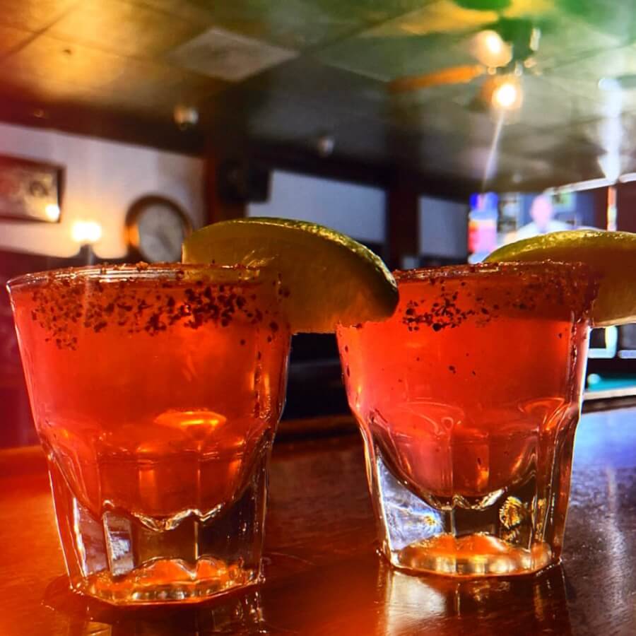 Ventura's Best Sports Bars for Game Day Two glasses of vodka cranberry with lime at O'Learys Tavern one of Ventura's sports bars