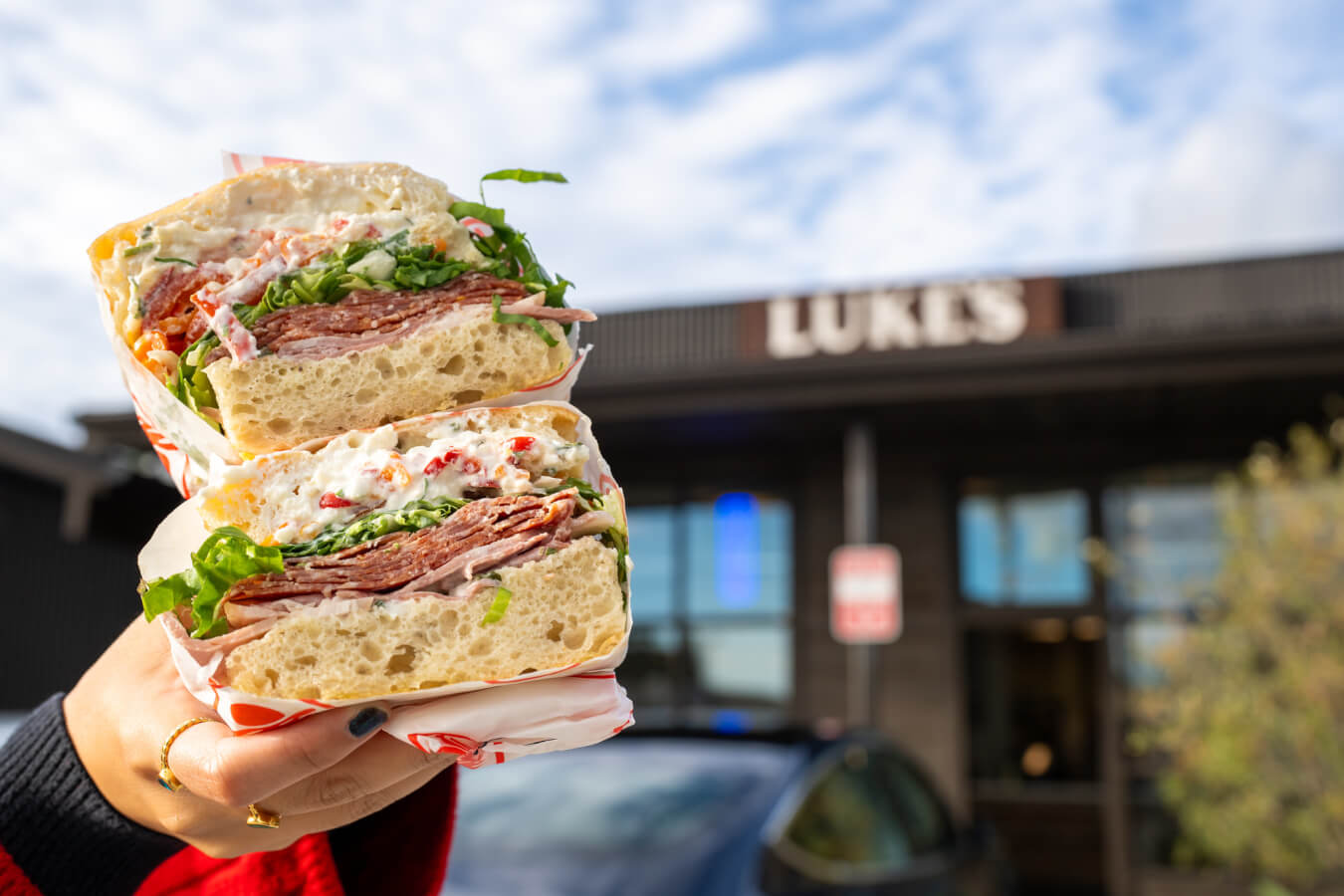 two halves of a meaty sandwich outside of Luke's on Main in Ventura, California